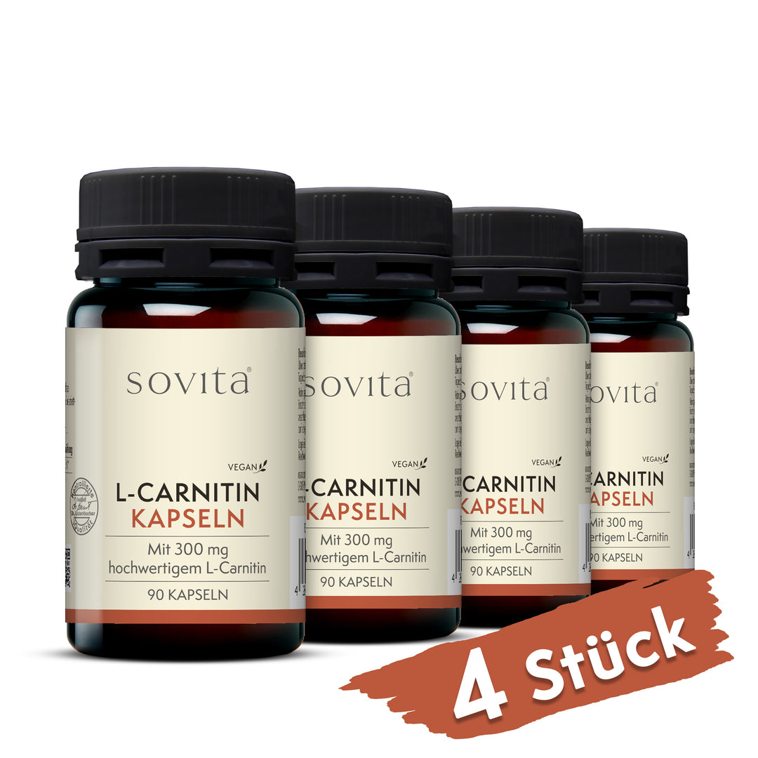 Vier Dosen Sovita L-Carnitin Kapseln aus Kunststoff nebeneinander mit dem Hinweis „4 Stück“.