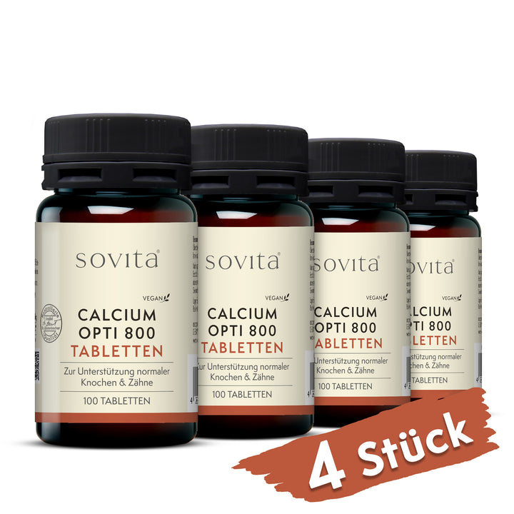Vier Dosen Sovita Calcium Opti 800 Tabletten aus Kunststoff nebeneinander mit dem Hinweis „4 Stück“.