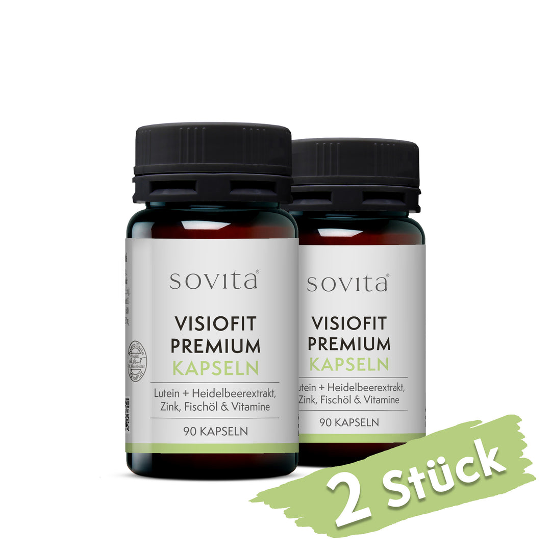 Zwei Dosen Sovita Visiofit Premium Kapseln in braunglasähnlichen Kunststoffbehältern nebeneinander