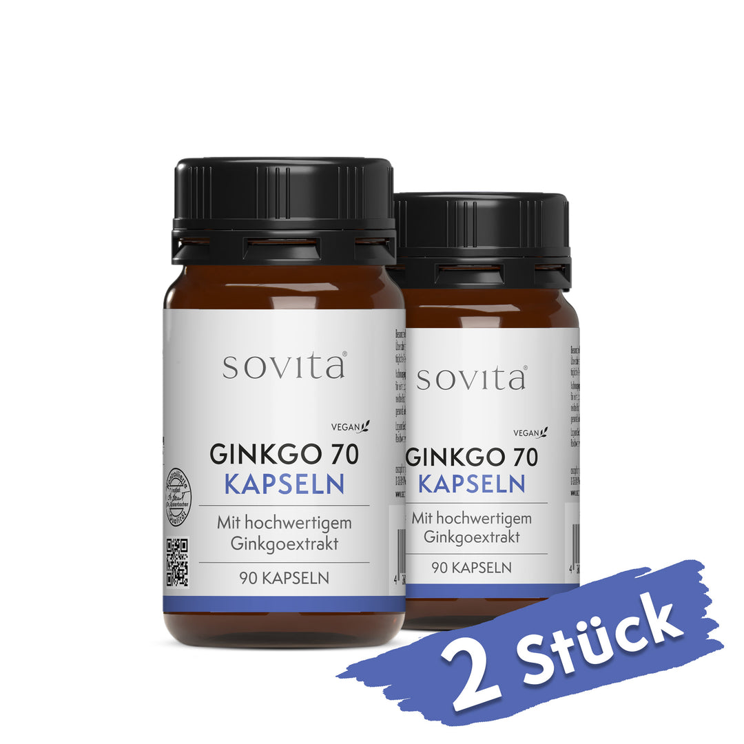Zwei Dosen sovita Ginkgo 70 Kapseln nebeneinander auf weißem Hintergrund, mit drei beigen Kapseln rechts und rotem Hinweis „2 Stück“